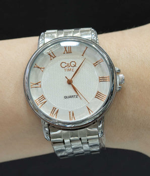 Reloj marca C&Q en acero inoxidable para dama